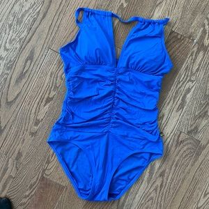 Bikini. Swimming . One piece. Excellent condition.Aqua Rose.